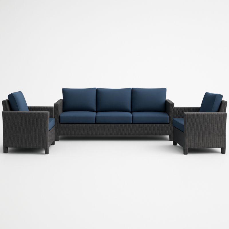Set salotto da esterno in polipropilene intrecciato con cuscini in tessuto blu