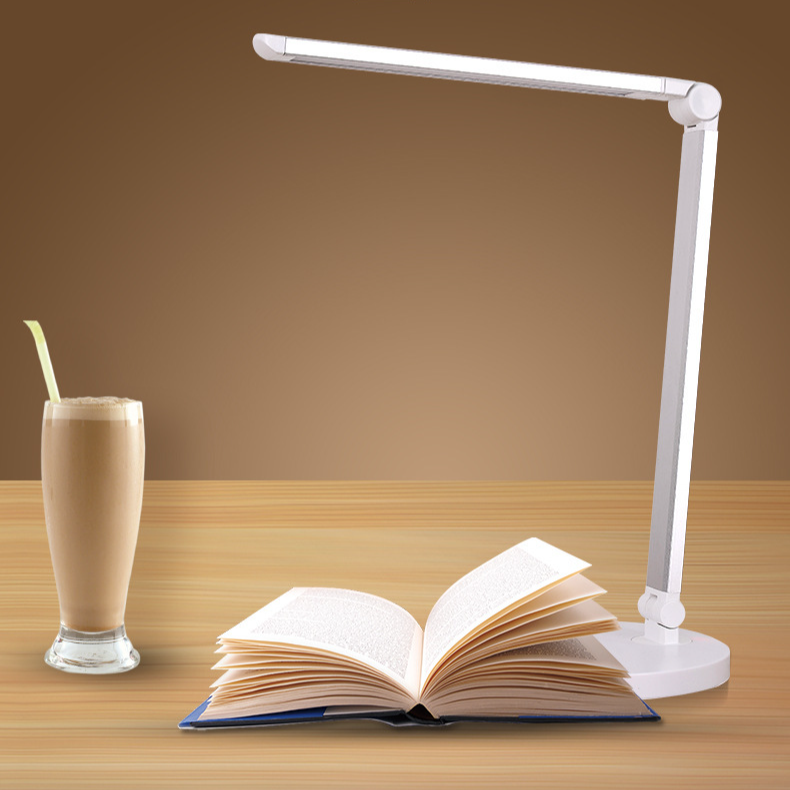 Touch-sensitive folding eye-protection lamp