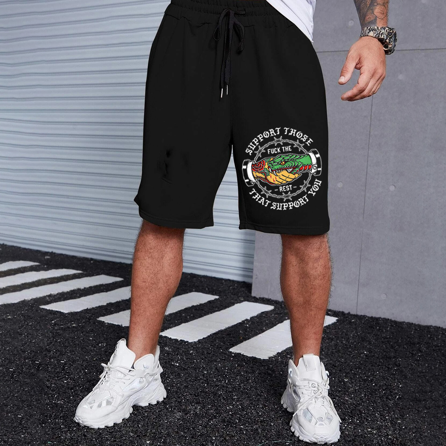 SUPPORT THOSE THAT SUPPORT YOU Snake Hand Black Print Shorts