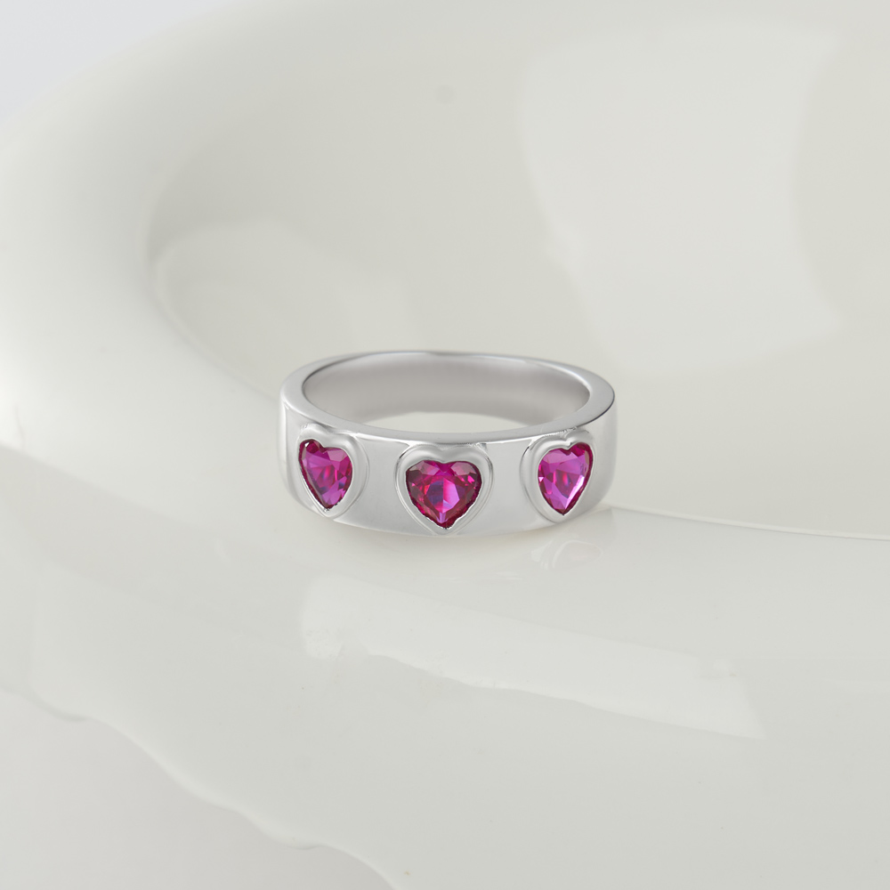 Three Heart Cut Ruby Red Sterling Silver Bezel Promise Ring