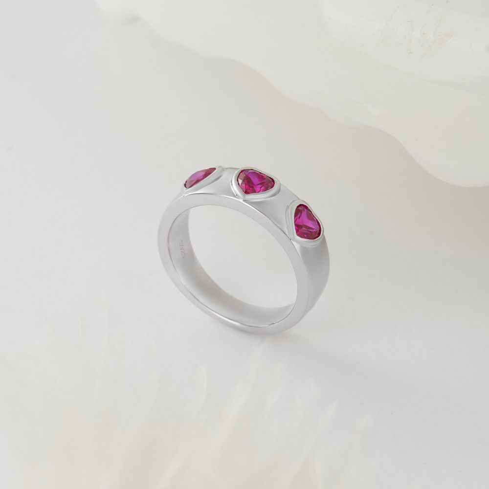 Three Heart Cut Ruby Red Sterling Silver Bezel Promise Ring