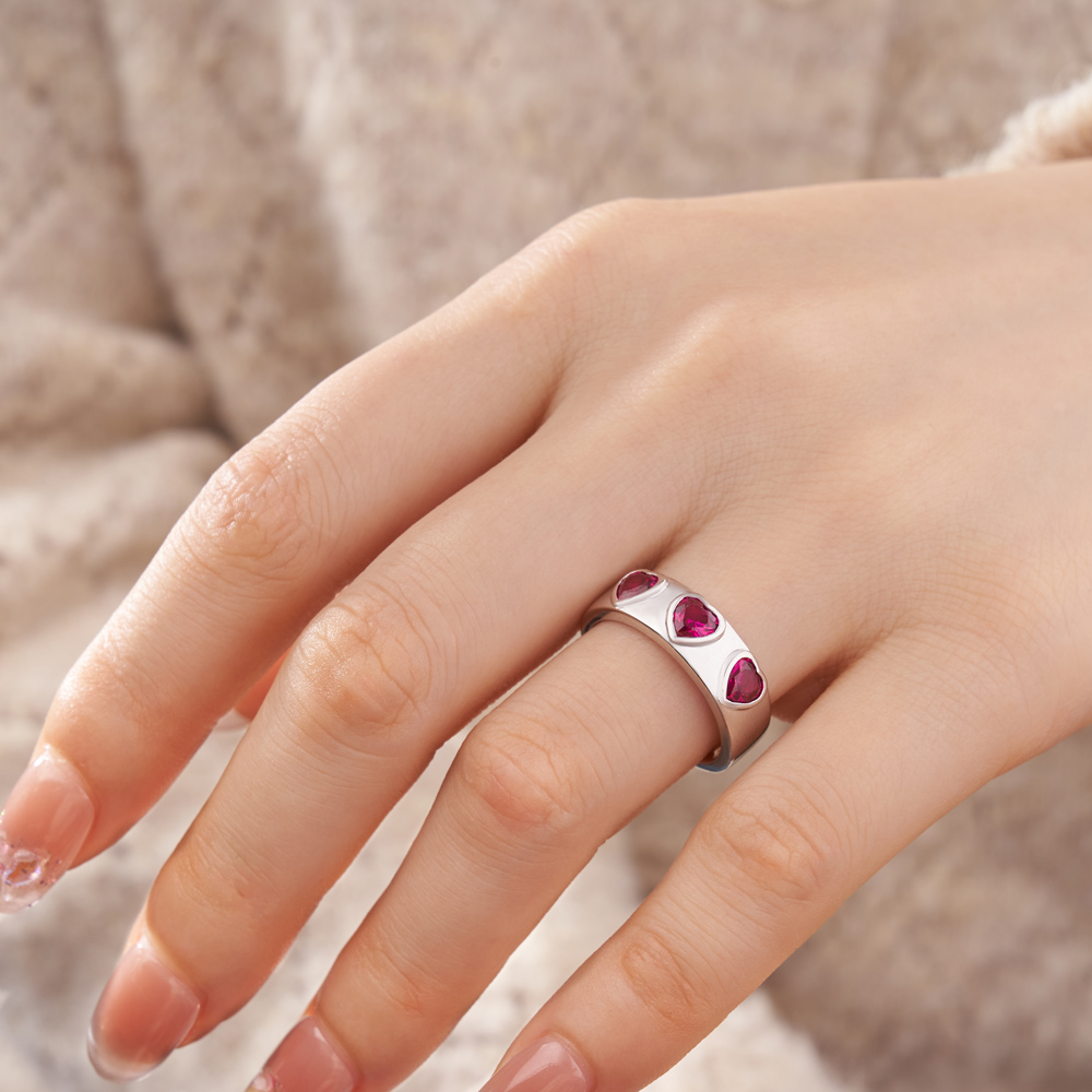 Three Heart Cut Ruby Red Sterling Silver Bezel Promise Ring
