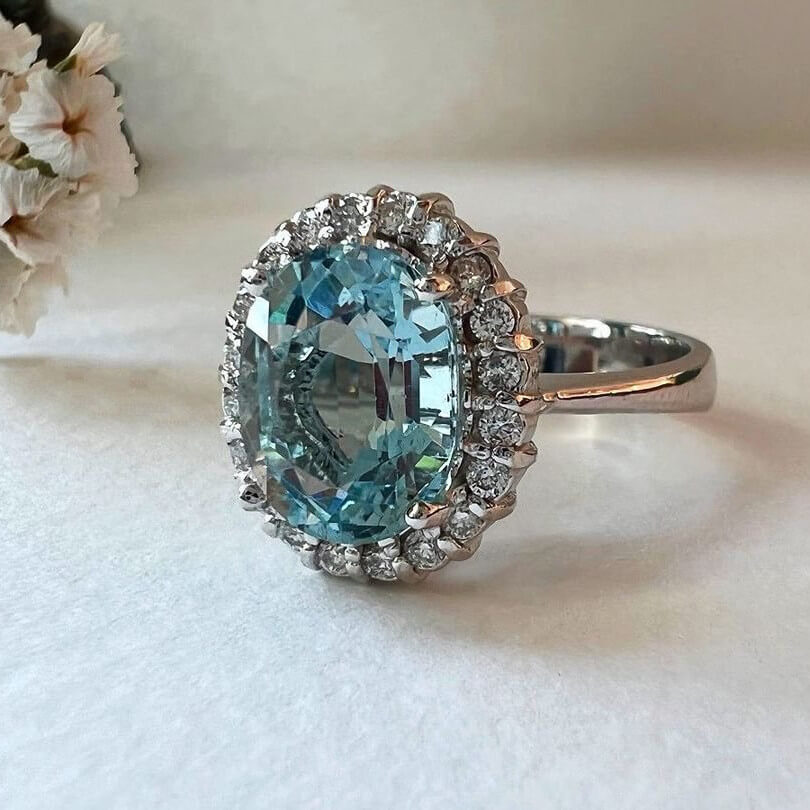 Oval Cut Aquamarine Sterling Silver Halo Engagement Ring