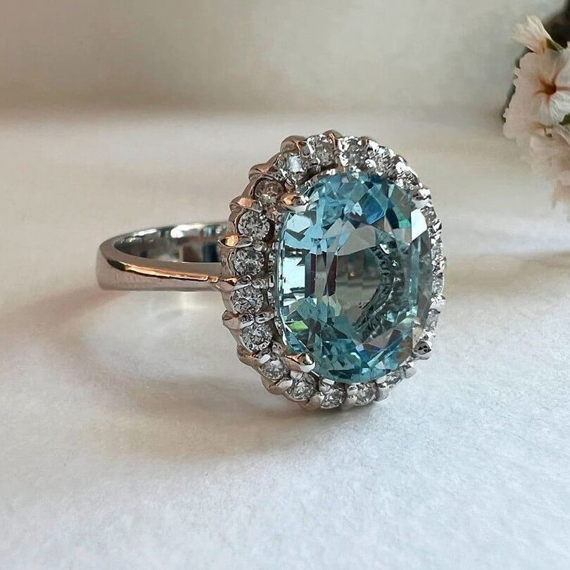 Oval Cut Aquamarine Sterling Silver Halo Engagement Ring