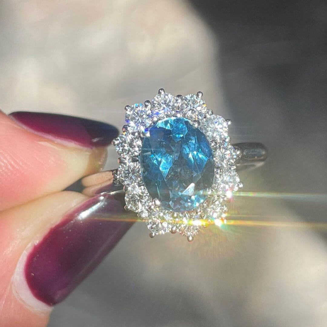 Oval Cut Aquamarine Sterling Silver Halo Engagement Ring