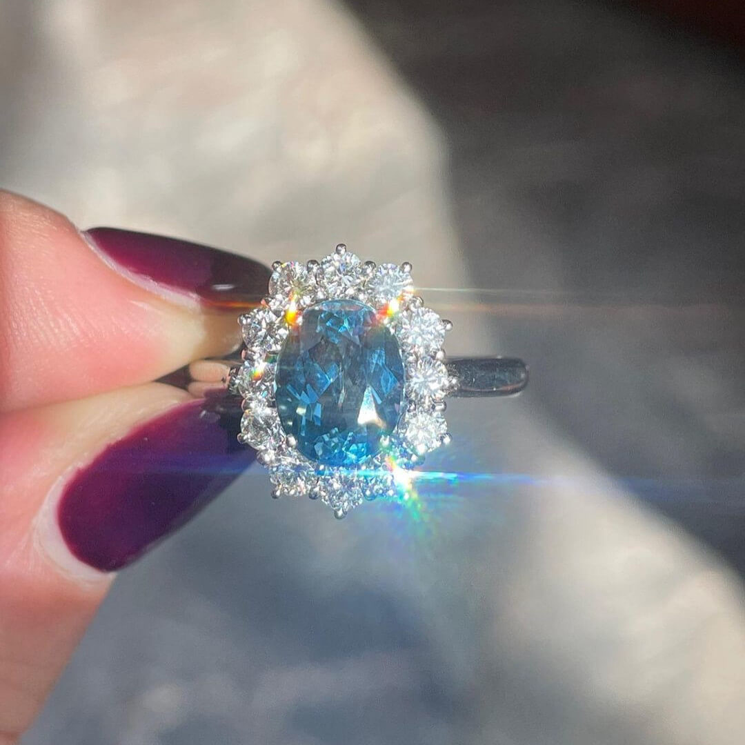 Oval Cut Aquamarine Sterling Silver Halo Engagement Ring