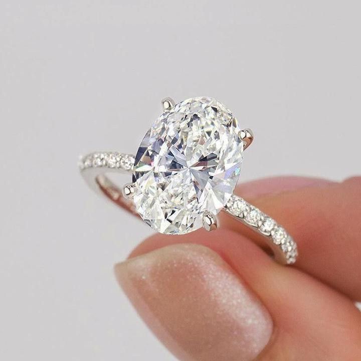 Oval Cut Diamond White Sterling Silver Engagement Ring
