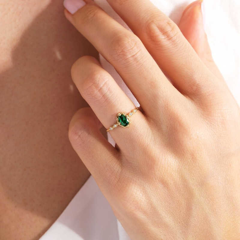 Oval Cut Emerald Green Sterling Silver Yellow Gold Engagement Ring