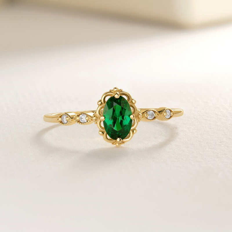 Oval Cut Emerald Green Sterling Silver Yellow Gold Engagement Ring