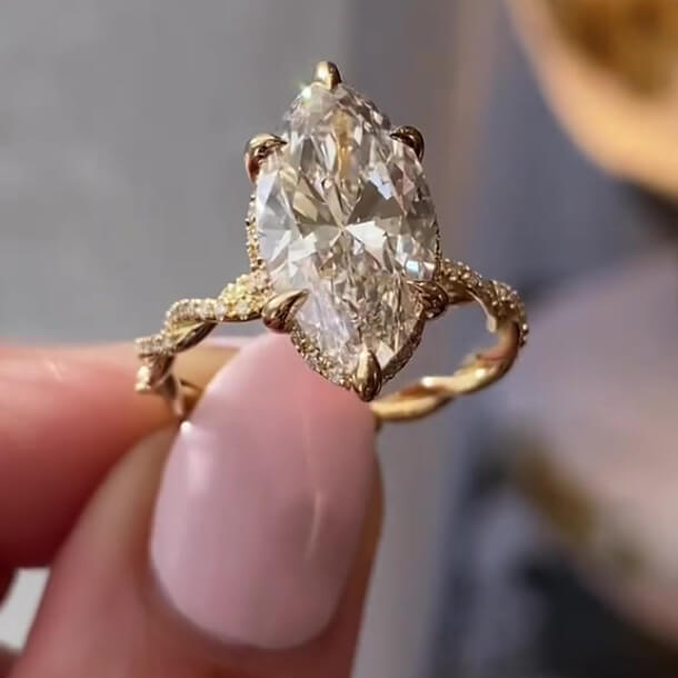 Marquise Cut Diamond White Sterling Silver Yellow Gold Intertwined Halo Engagement Ring