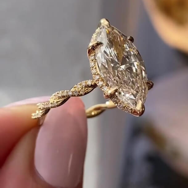 Marquise Cut Diamond White Sterling Silver Yellow Gold Intertwined Halo Engagement Ring