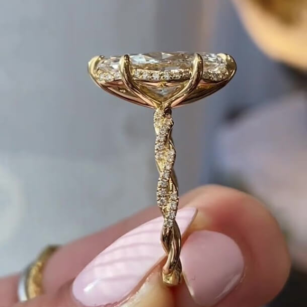 Marquise Cut Diamond White Sterling Silver Yellow Gold Intertwined Halo Engagement Ring