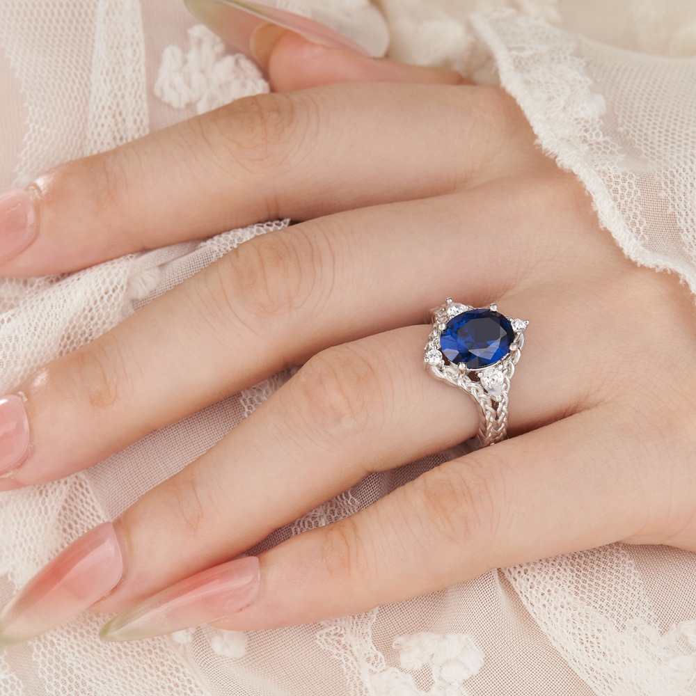 Oval Cut Sapphire Blue Sterling Silver Braided Celtic Engagement Ring
