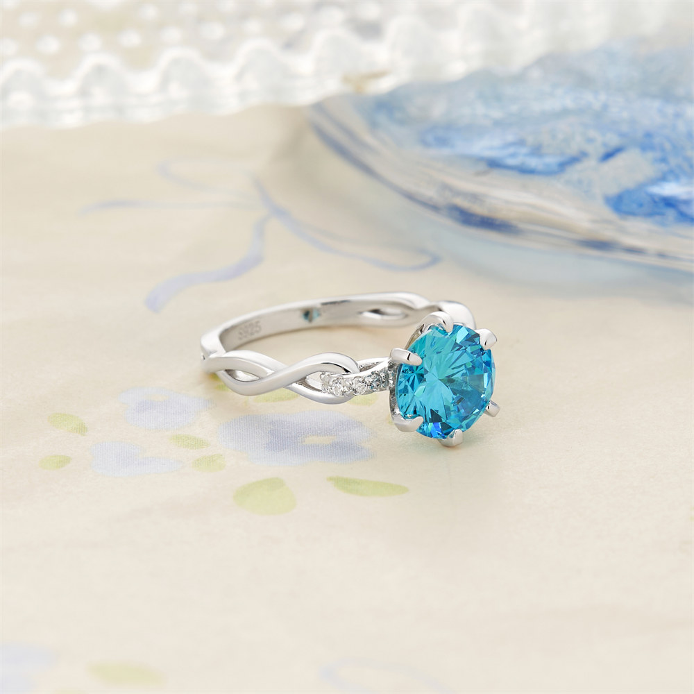 Round Cut Aquamarine Blue Sterling Silver Intertwined Twisted Engagement Ring