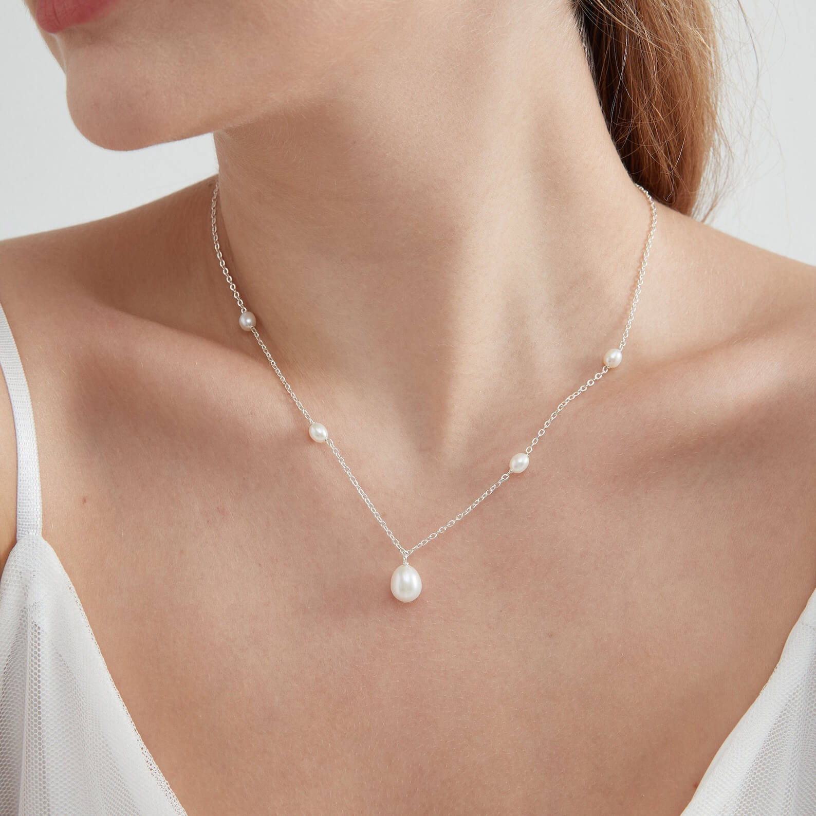 Teardrop White Pearl with Side Accent Pearls Sterling Silver Pendant Necklace