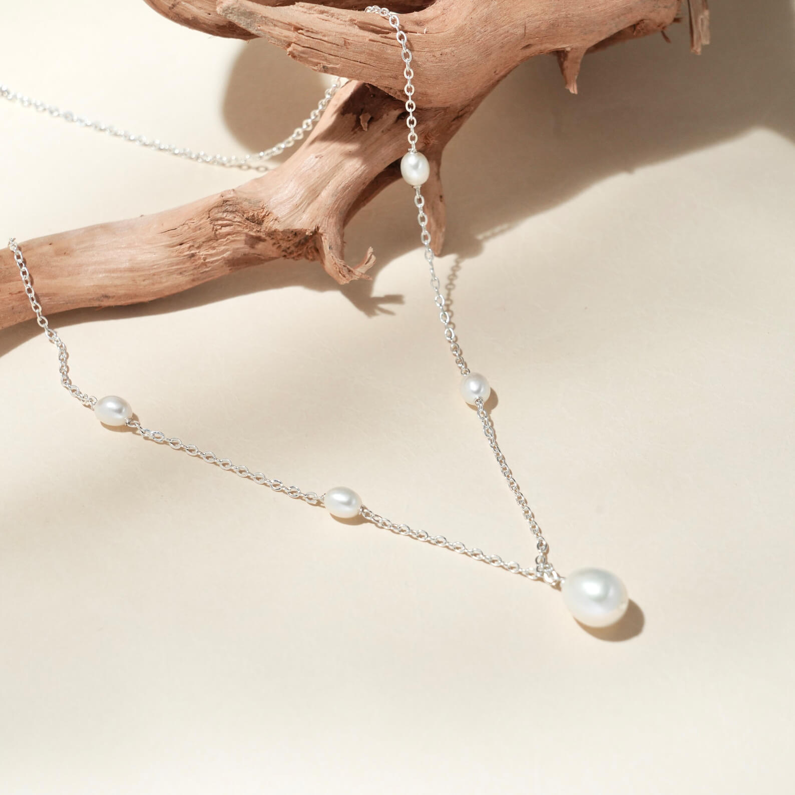 Teardrop White Pearl with Side Accent Pearls Sterling Silver Pendant Necklace