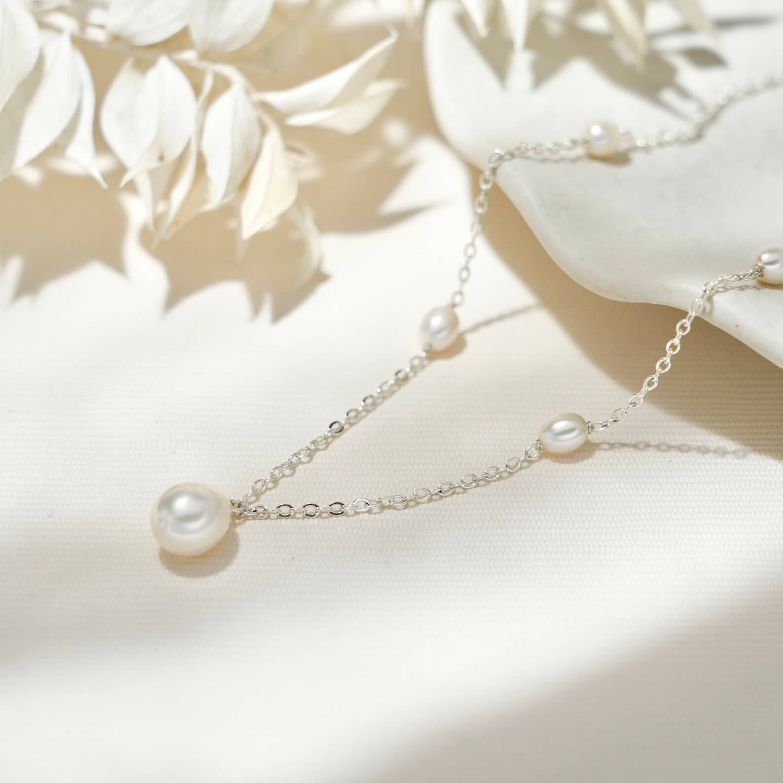 Teardrop White Pearl with Side Accent Pearls Sterling Silver Pendant Necklace