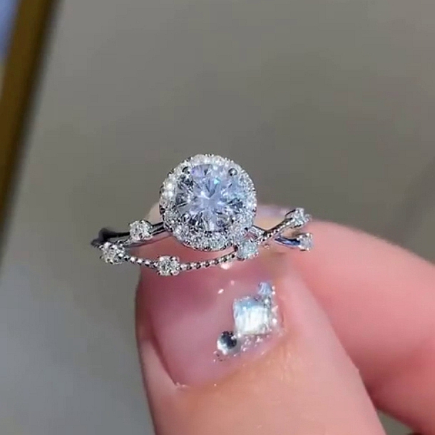 Round Cut Diamond White Halo Art Deco Engagement Ring in Sterling Silver