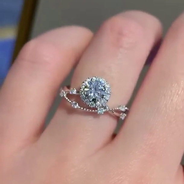 Round Cut Diamond White Halo Art Deco Engagement Ring in Sterling Silver