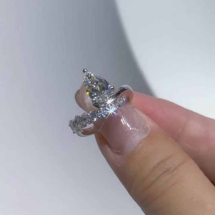 Pear Cut Diamond White Sterling Silver Curved Engagement Ring
