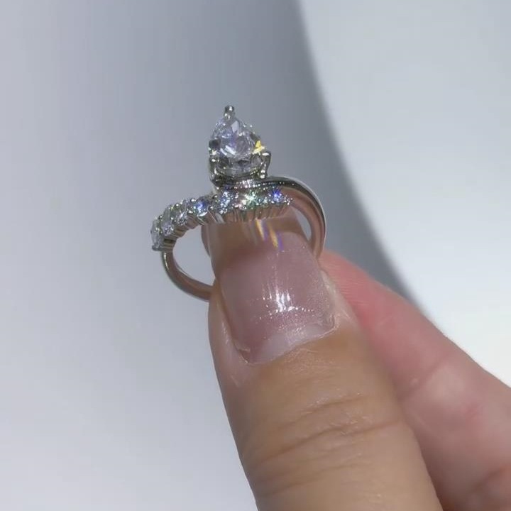 Pear Cut Diamond White Sterling Silver Curved Engagement Ring