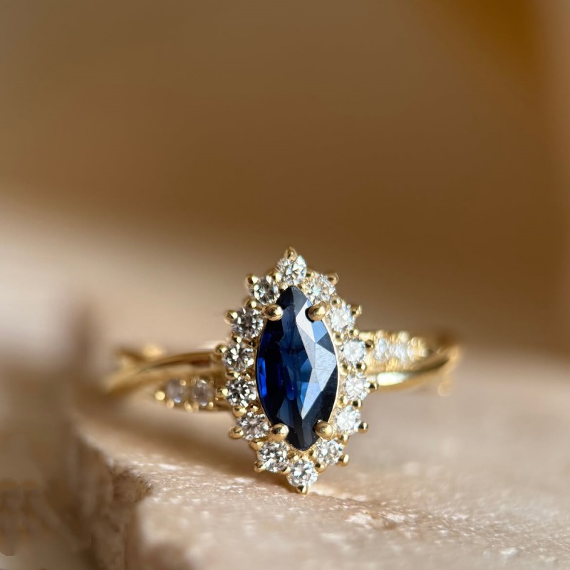 Marquise Cut Sapphire Blue Sterling Silver Yellow Gold Twisted Halo Engagement Ring