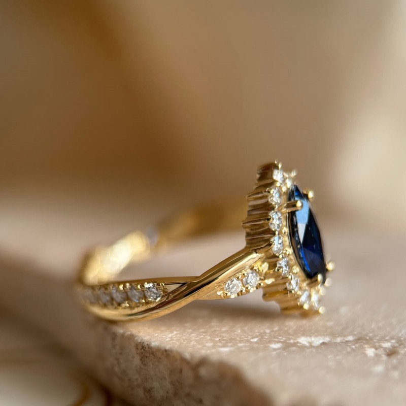 Marquise Cut Sapphire Blue Sterling Silver Yellow Gold Twisted Halo Engagement Ring