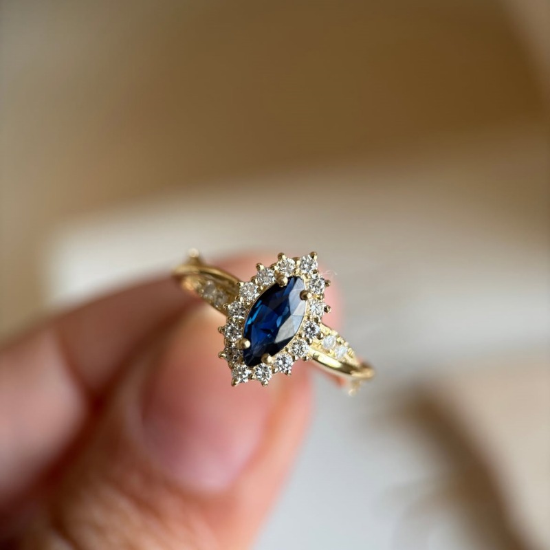 Marquise Cut Sapphire Blue Sterling Silver Yellow Gold Twisted Halo Engagement Ring