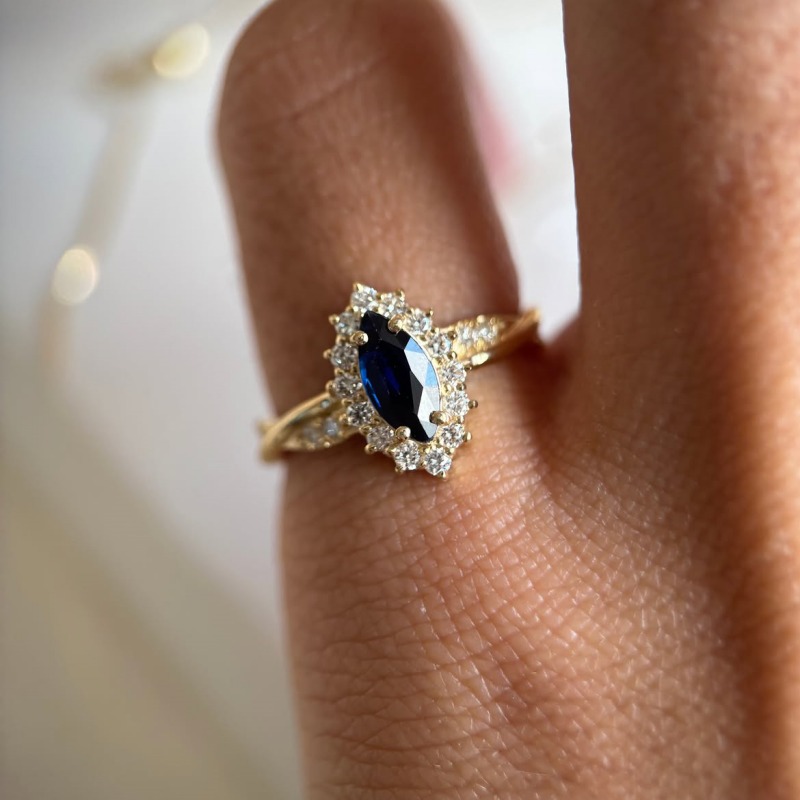 Marquise Cut Sapphire Blue Sterling Silver Yellow Gold Twisted Halo Engagement Ring