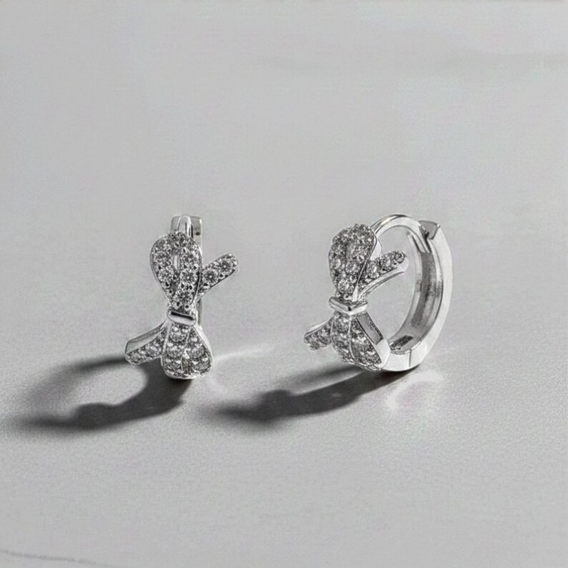 Round Cut Diamond White 925 Sterling Silver Bow Knot Huggie Earrings