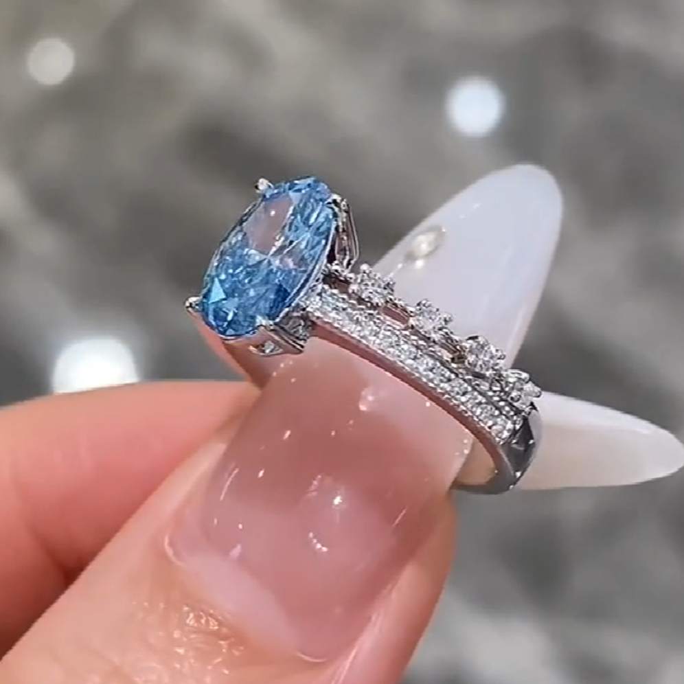 Oval Cut Sapphire Blue Sterling Silver Engagement Ring