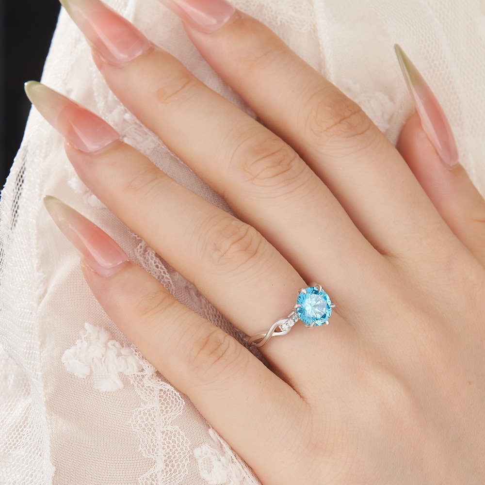 Round Cut Aquamarine Blue Sterling Silver Intertwined Twisted Engagement Ring