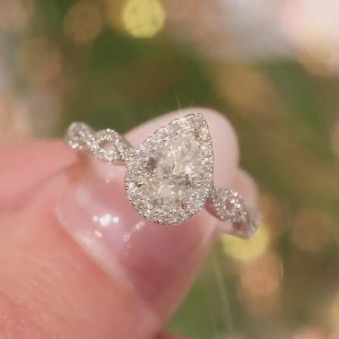 Pear Cut Diamond White Sterling Silver Twisted Halo Engagement Ring