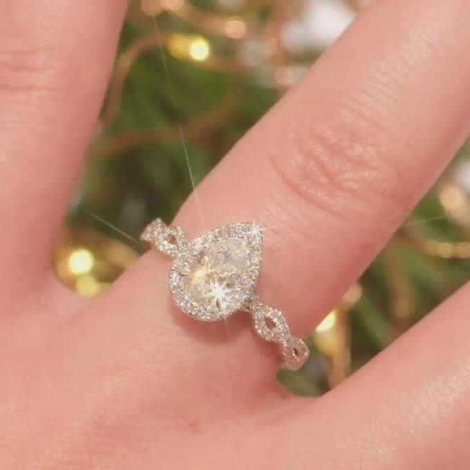 Pear Cut Diamond White Sterling Silver Twisted Halo Engagement Ring