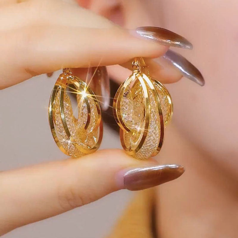 Wysoki design i dostępny luksus: owalne kolczyki ze srebra próby 925