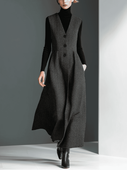 Elegant women's wide-leg jumpsuit with tailored waist and button details, ideal for stylish fashion statements.