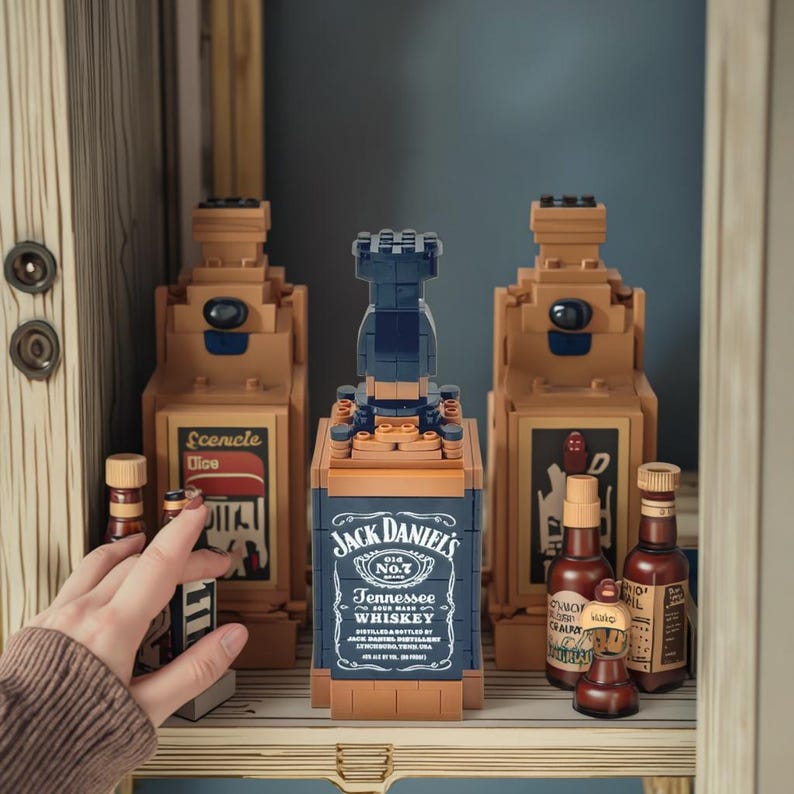 May include: A white ceramic mug with a black handle and the text "But First, Coffee" in a bold, black font. The mug is set against a blurred background, suggesting a cozy setting.