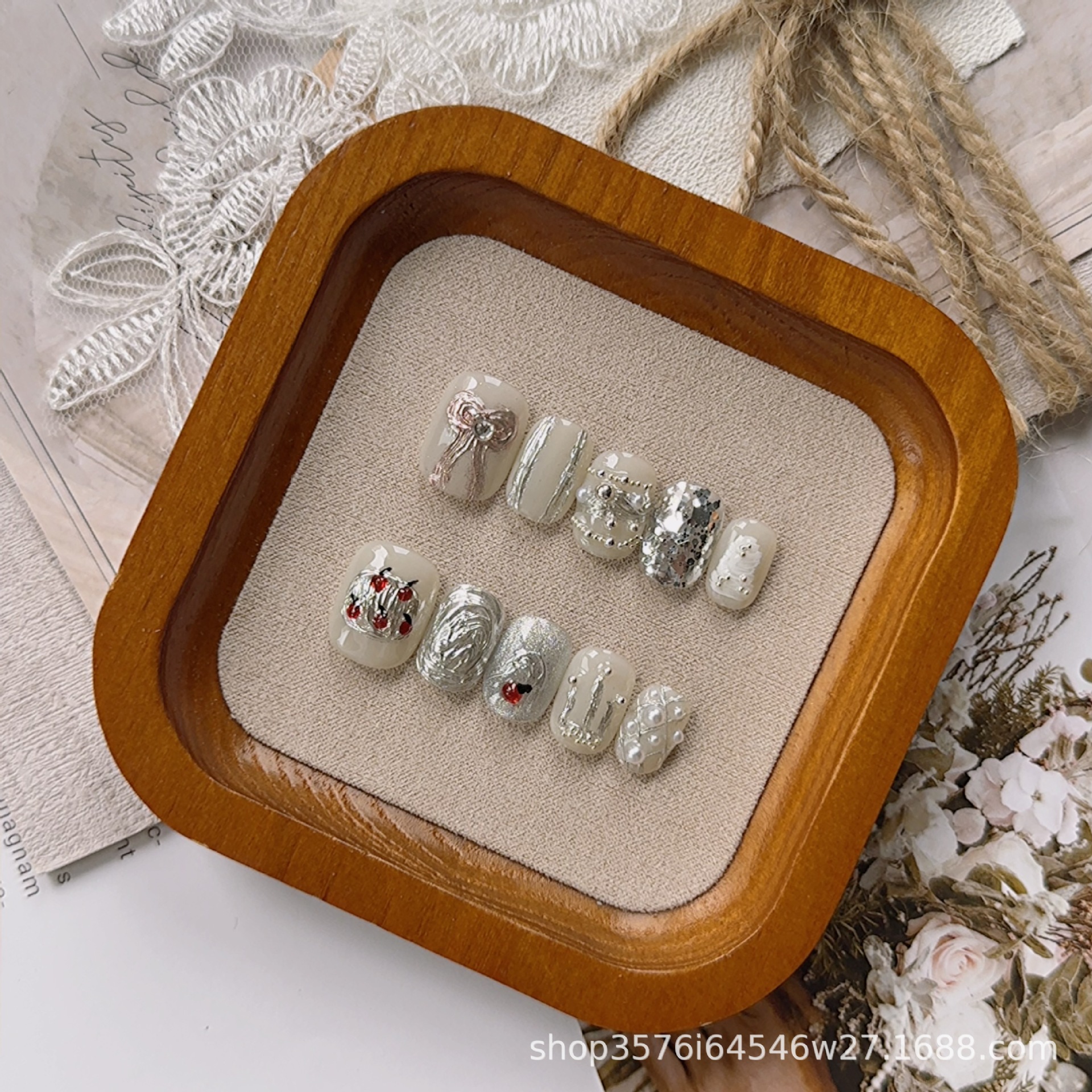 : Long Teardrop-Shaped Rhinestones & French Manicure Style