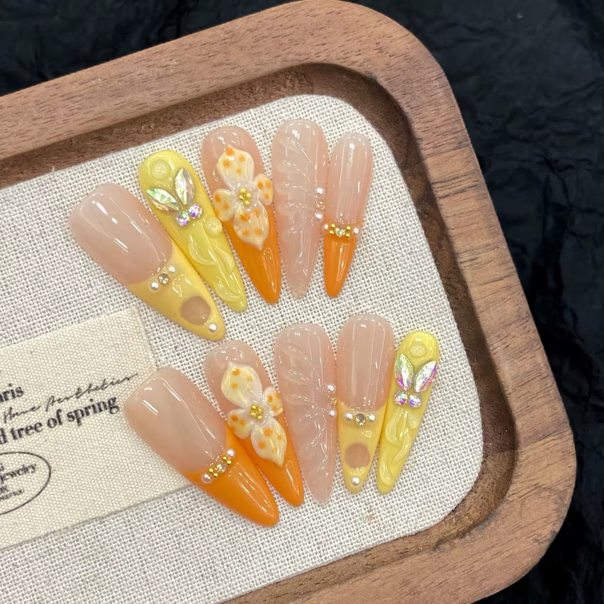 Vibrant Summer Orange Press-On Nails: Long Teardrop-Shaped Rhinestones & French Manicure Style