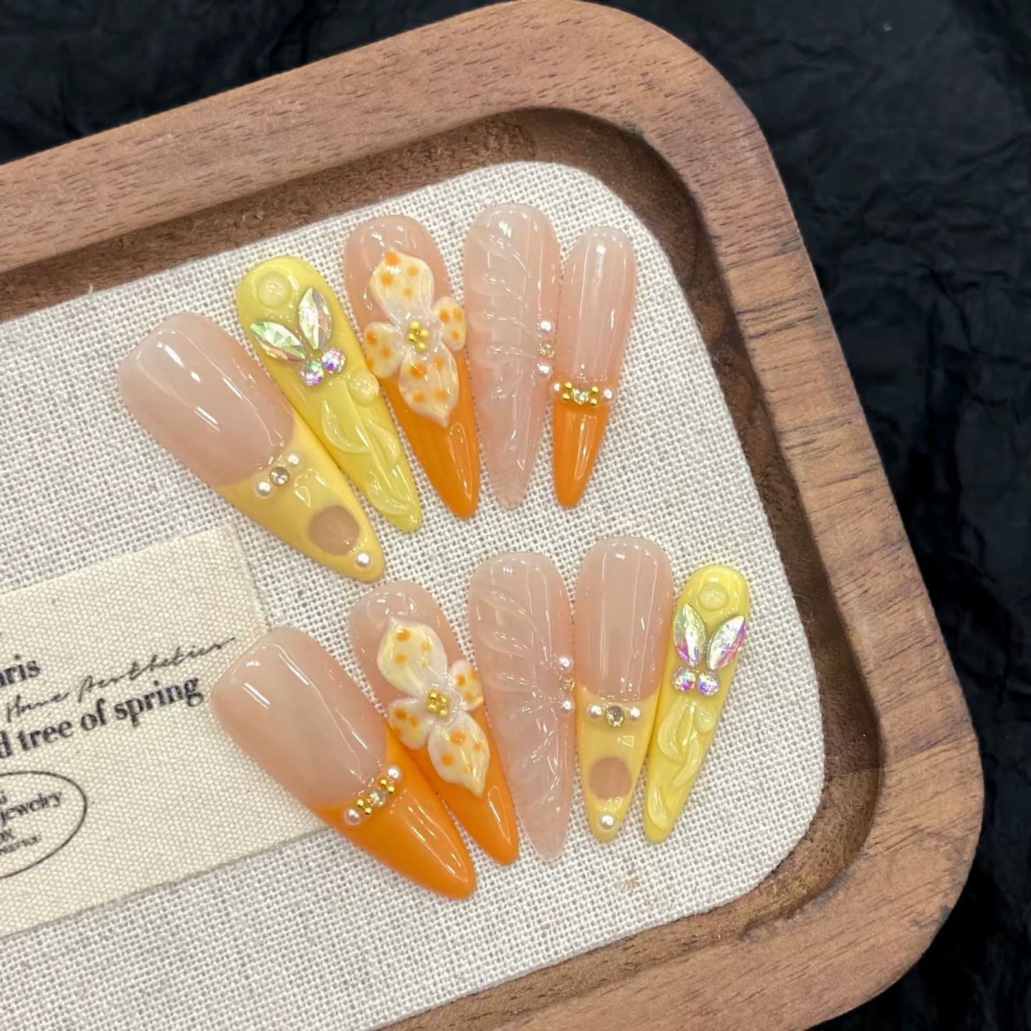 Vibrant Summer Orange Press-On Nails: Long Teardrop-Shaped Rhinestones & French Manicure Style