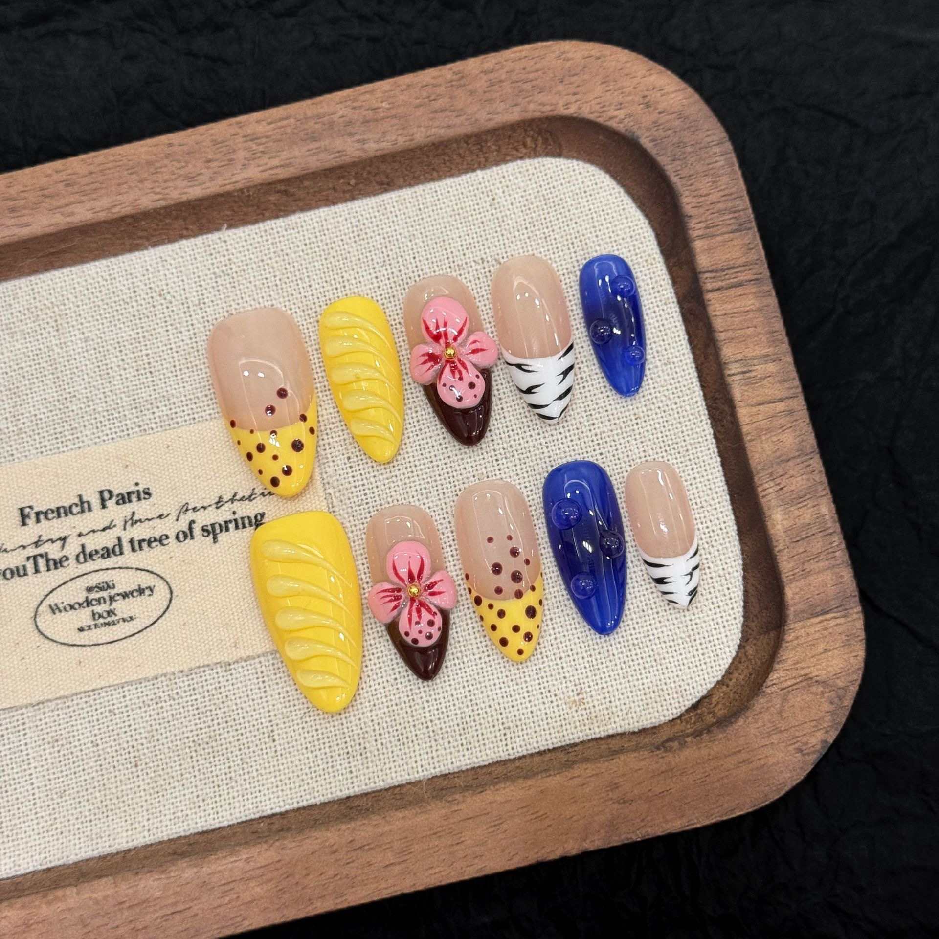 : Long Teardrop-Shaped Rhinestones & French Manicure Style