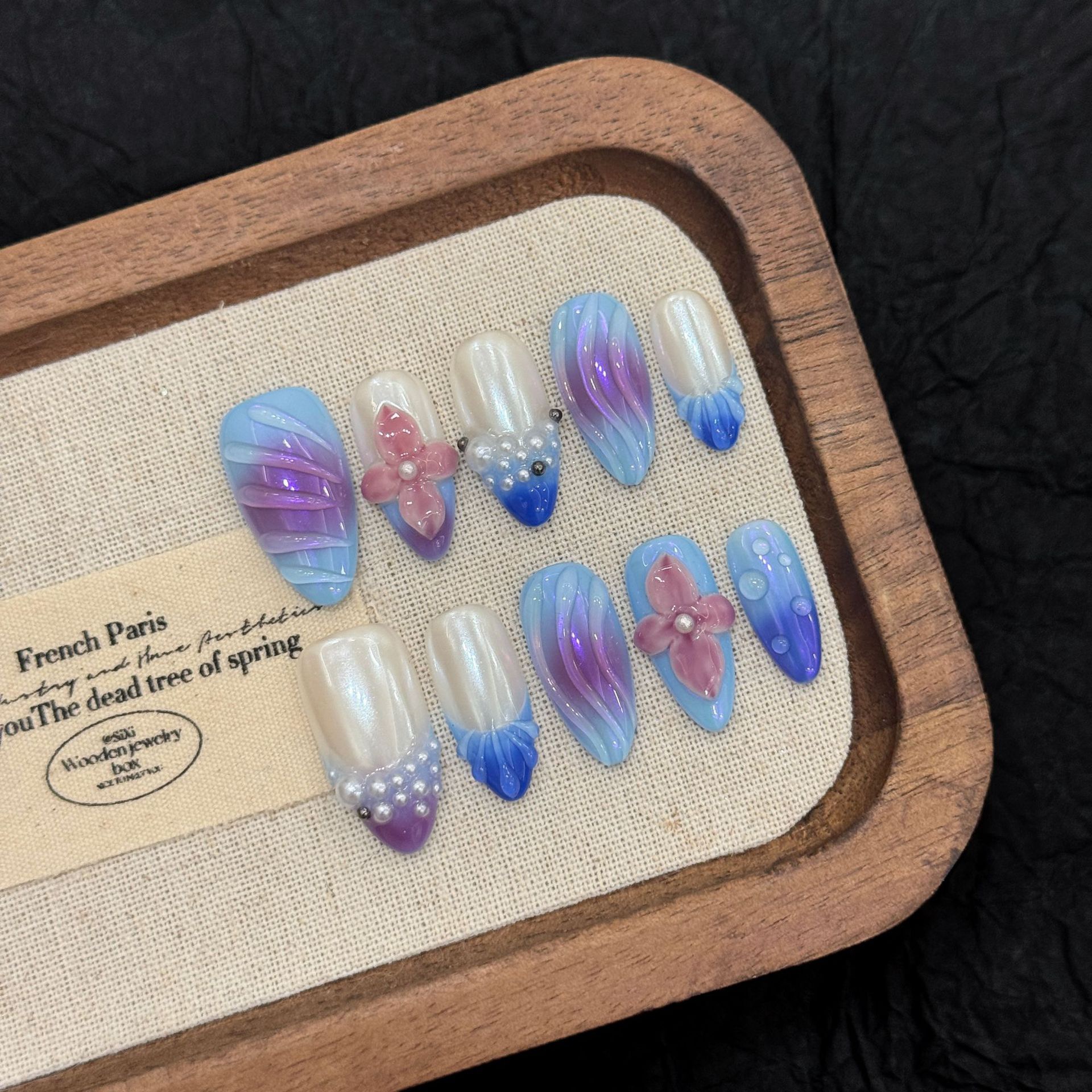 : Long Teardrop-Shaped Rhinestones & French Manicure Style