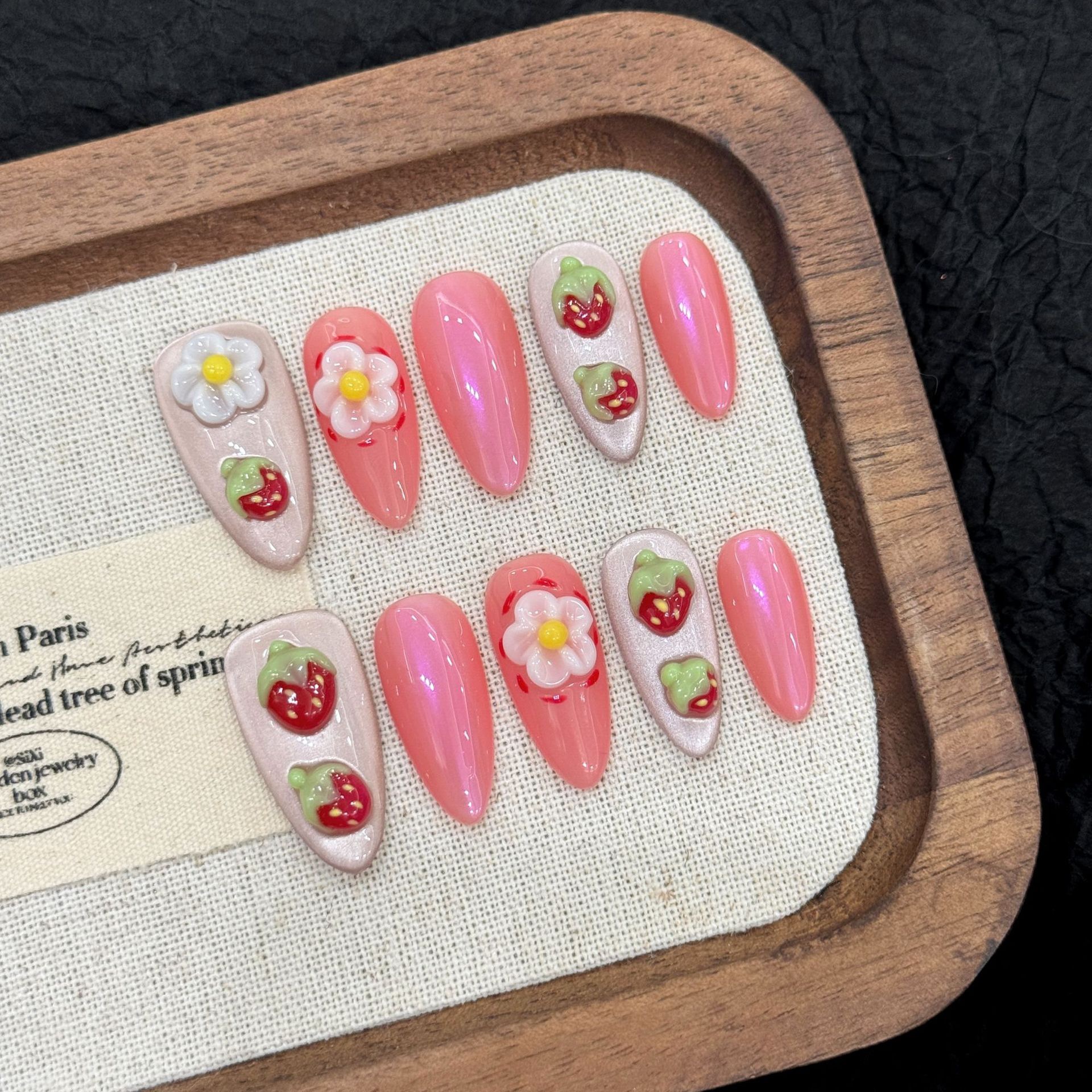 : Long Teardrop-Shaped Rhinestones & French Manicure Style