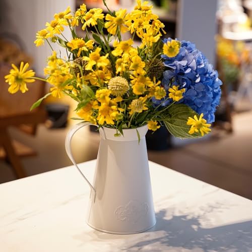 Soft white AnnieGarden metal pitcher vase with yellow and blue flowers