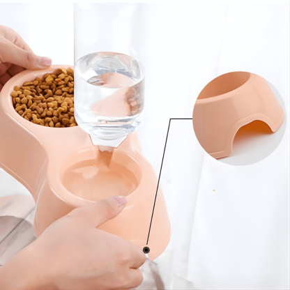 Pet feeding station with water bottle and food bowl on a white background