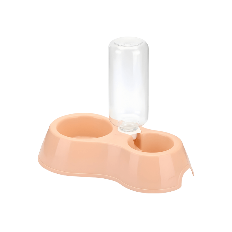 Pink pet feeder with a clear bottle on a white background