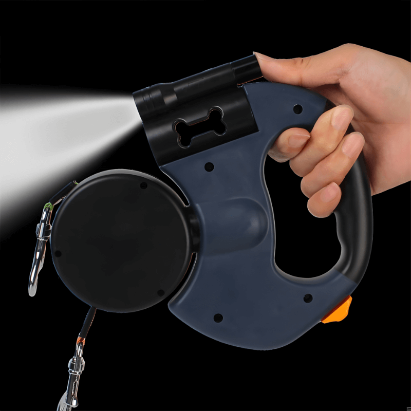 Retractable LED flashlight held by a hand with text indicating its use for guiding dogs and night lighting.