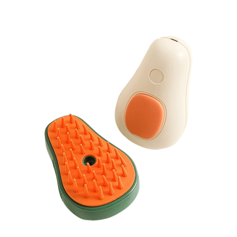 Two grooming tools, one green and orange with bristles, the other beige with an orange button, on a white background.
