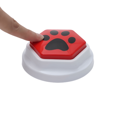 Button with a red paw print on a white background