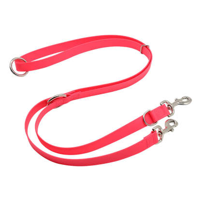 Pink dog leash with metal clips on a white background